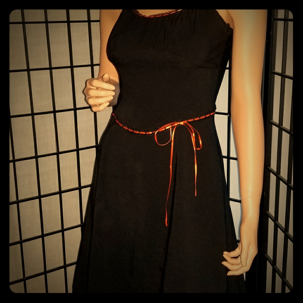 Black retro dress with orange ribbon bow